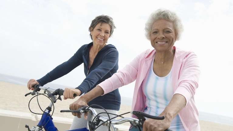 ladies riding bicycles