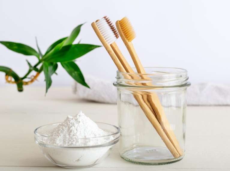 baking soda and a pair of toothbrush