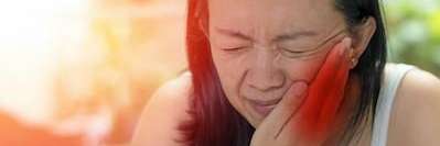 woman in dental pain